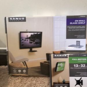 Tv wall mount and glass shelf never used